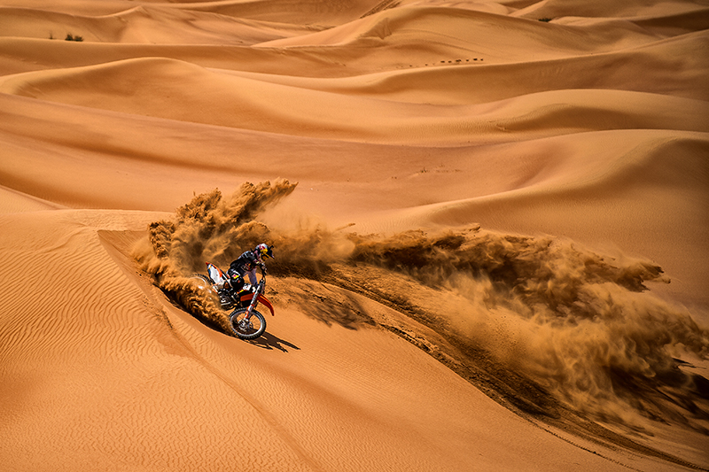 Motocross Freeride Over the Sand Dunes in Nazwa Desert - Dubai / UAE